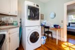 Main level laundry with new stacked washer and dryer 